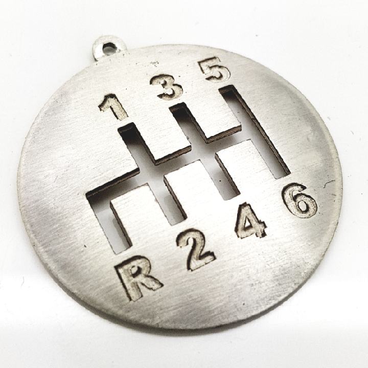 gioielli-personalizzati-particolari-classicitaglio-laser-oro-argento-pomello-marce-automobile-laboratorio-orafo-roma-flambojan