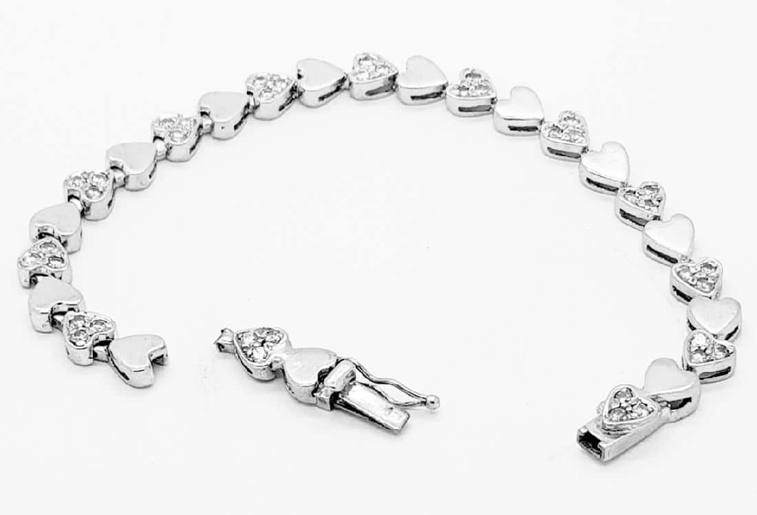 Riparazione bracciale tennis diamanti fantasia laboratorio orafo roma flambojan